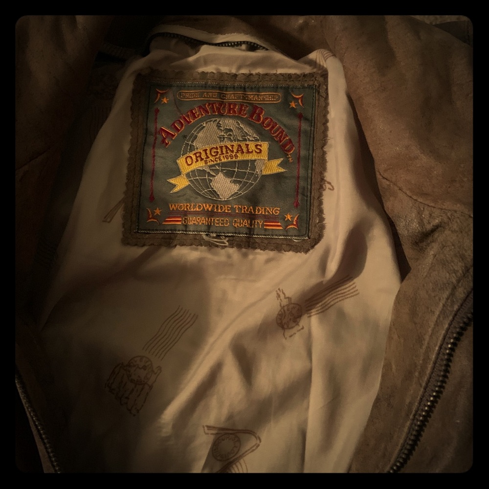 Weathered adventure bound leather bomber jacket